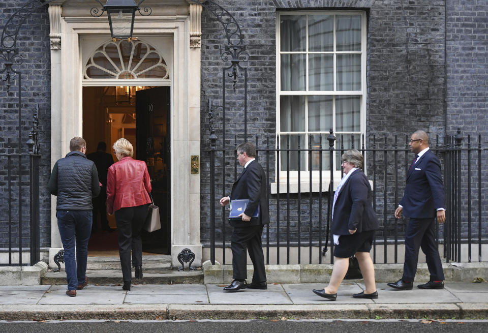 Lawmakers arrive for a Cabinet Meeting, with, from 2nd left, Britain's Business Secretary Andrea Leadsom, Justice Secretary Robert Buckland, Work and Pensions Secretary Therese Coffey and Conservative Party Chairman James Cleverly, arrive at 10 Downing Street in London, Tuesday Oct. 8, 2019. Britain and the European Union appeared to be poles apart Monday on a potential Brexit deal. (Stefan Rousseau/PA via AP)