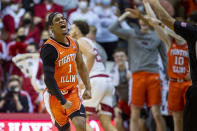 Illinois guard Trent Frazier (1) reacts after hitting a 3-point basket during the second half of an NCAA college basketball game against Indiana, Saturday, Feb. 5, 2022, in Bloomington, Ind. (AP Photo/Doug McSchooler)