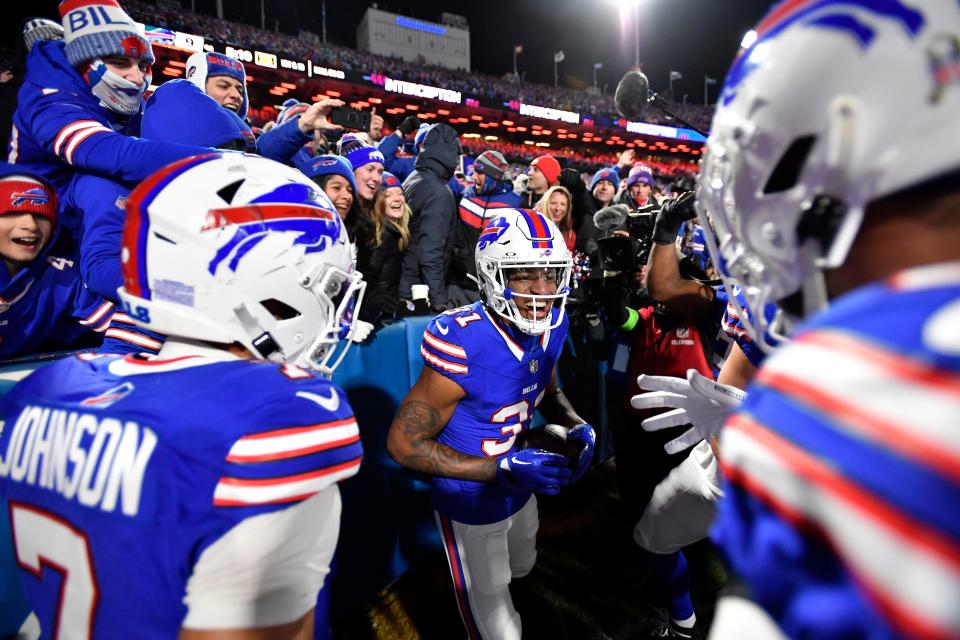 Buffalo Bills cornerback Rasul Douglas (31) celebrates after an interception during the first half of an NFL football game against the New York Jets in Orchard Park, N.Y., Sunday, Nov. 19, 2023. (AP Photo/Adrian Kraus)
