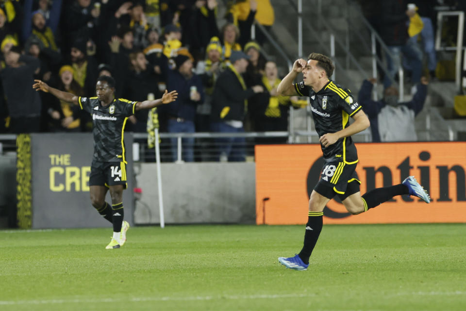 Columbus Crew's Malte Amundsen, right, celebrates after his goal against Atlanta United during the first half of an MLS playoff soccer match Sunday, Nov. 12, 2023, in Columbus, Ohio. (AP Photo/Jay LaPrete)