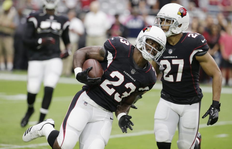 Arizona Cardinals running back Adrian Peterson (23) scored on his first series with his new team. (AP)