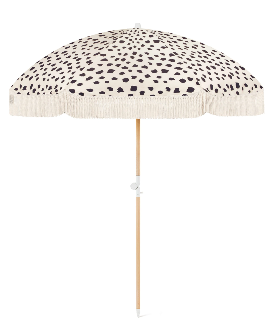 <h2>Sunday Supply Co. Black Sands Beach Umbrella<br></h2><br>Sunday Supply Co. is home to summer's <a href="https://www.refinery29.com/en-us/sunday-supply-co-beach-essentials" rel="nofollow noopener" target="_blank" data-ylk="slk:new hottest beach accessory" class="link ">new hottest beach accessory</a>: the Black Sands Beach Umbrella. Readers took a liking to many of the brand's coastal collections — chairs, towels, bags, etc. — but the umbrella stands out due to its 25% off price tag. (Use code <strong>HAPPY4TH</strong> at checkout!) <br><br><em>Shop <strong><a href="https://go.linkby.com/ADGTGNYZ/collections/beach-umbrellas/products/black-sands-beach-umbrella" rel="nofollow noopener" target="_blank" data-ylk="slk:Sunday Supply Co." class="link ">Sunday Supply Co.</a></strong></em><br><br><strong>Sunday Supply Co.</strong> Black Sands Beach Umbrella, $, available at <a href="https://go.skimresources.com/?id=30283X879131&url=https%3A%2F%2Fgo.linkby.com%2FADGTGNYZ%2Fcollections%2Fbeach-umbrellas%2Fproducts%2Fblack-sands-beach-umbrella" rel="nofollow noopener" target="_blank" data-ylk="slk:Sunday Supply Co." class="link ">Sunday Supply Co.</a>