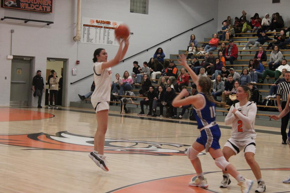 Tati Vazquez takes a three-pointer in Gardner's game against Narragansett on Dec. 7, 2023. Vazquez led the Wildcats with 20 points in the 59-40 victory.