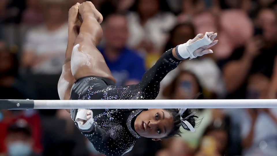 Biles competes in the uneven bars on day four of the championships. - Ezra Shaw/Getty Images