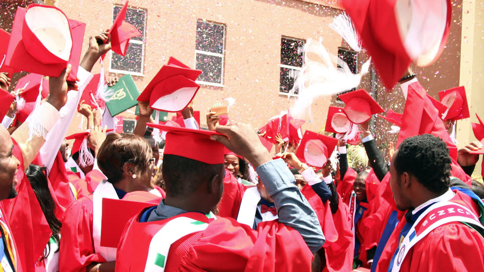 Graduates in red gowns celebrating at a university in north-eastern Nigeria - 2015