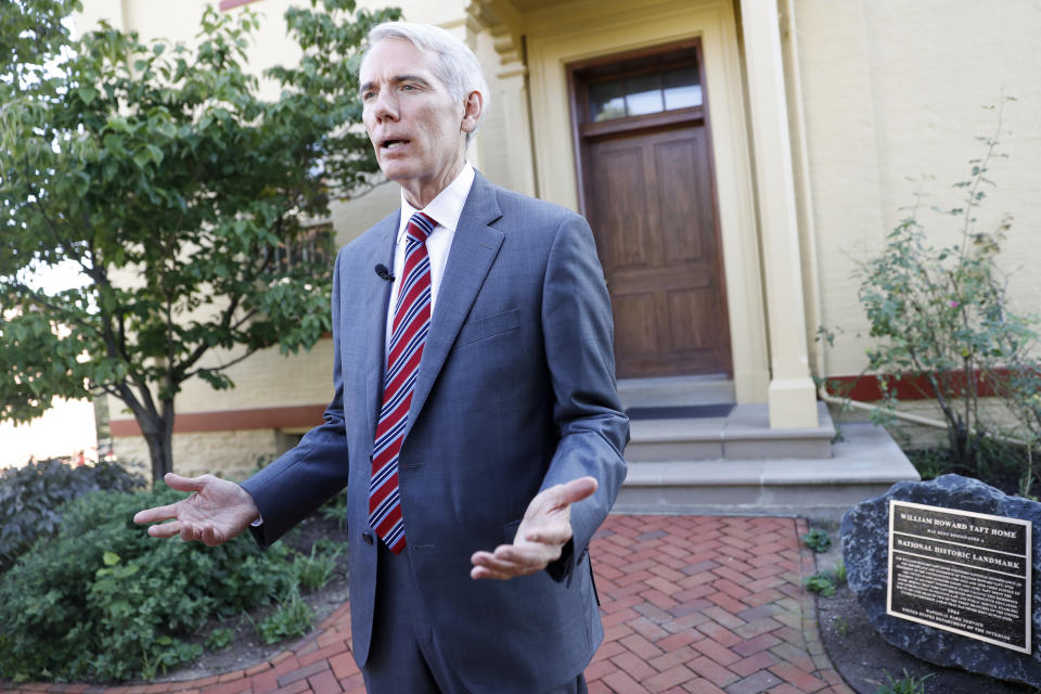 Sen. Rob Portman, R-Ohio, is interviewed outside the William Howard Taft National Historic Site, Friday, Sept. 14, 2018, in Cincinnati. Portman, who's been a strong advocate for Supreme nominee Brett Kavanaugh, remains confident he will be confirmed after a "way too partisan" battle in Washington. (AP Photo/John Minchillo)