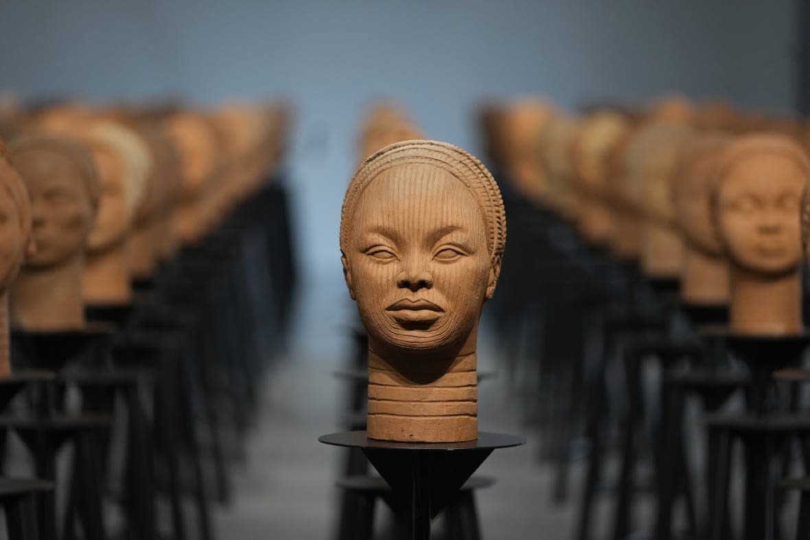 Sculptures created by French artist Prune Nourry, Inspired by ancient Nigerian Ife terracotta heads, titled “Statues Also Breathe,” and representing the remaining 108 Chibok still in captivity are displayed in Lagos, Nigeria, Tuesday, Dec. 13, 2022. (AP Photo/Sunday Alamba)