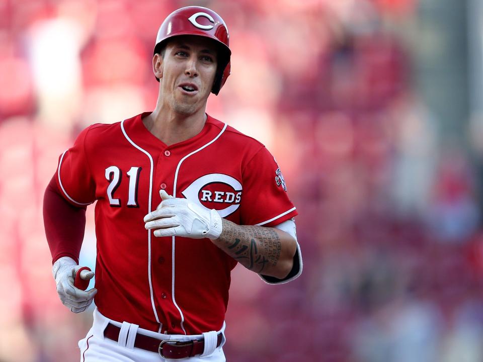 Reds relief pitcher Michael Lorenzen (21) hits a pinch-hit grand slam in the seventh inning against the Milwaukee Brewers on June 30, 2018, at Great American Ball Park.