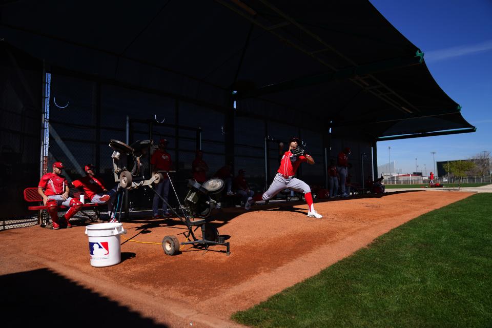 Reds pitcher Nick Martinez throws in the bullpen during spring training workouts last month at the team's spring training facility in Goodyear, Ariz.