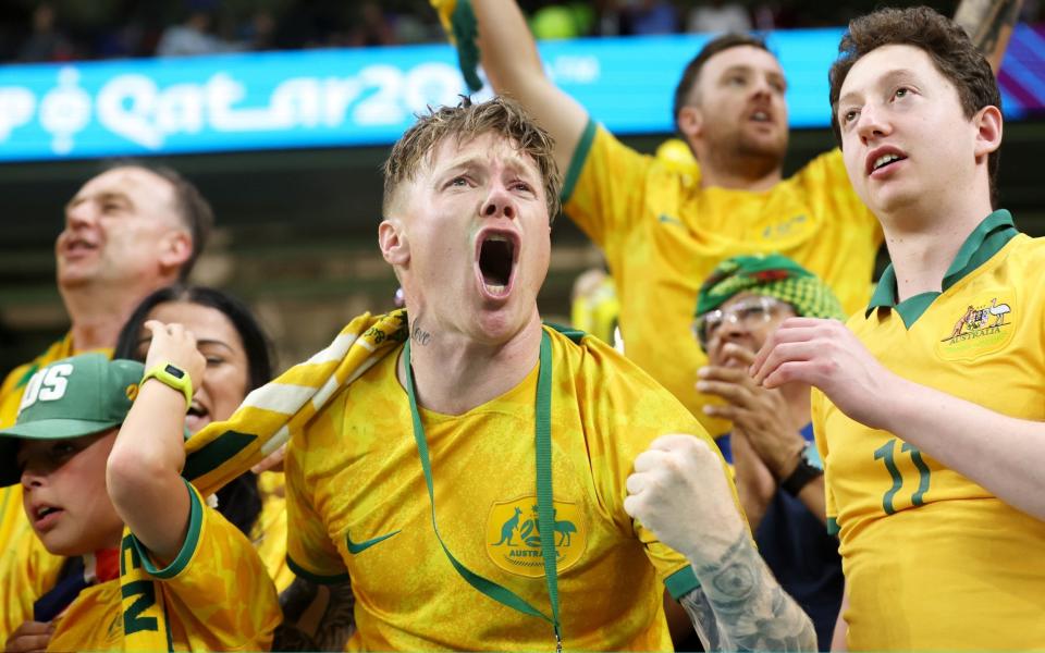 Australia fans celebrate their team's first goal during the FIFA World Cup Qatar 2022 Group D match between Australia and Denmark at Al Janoub Stadium - Alex Grimm/Getty Images