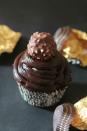 <p>This cupcake is for you if you like chocolate, chocolate and chocolate.</p><p><strong><a href="http://ikneadtoeat.com/ferrero-rocher-stuffed-chocolate-cupcakes-with-chocolate-ganache/" rel="nofollow noopener" target="_blank" data-ylk="slk:Get the recipe at I Knead to Eat.;elm:context_link;itc:0;sec:content-canvas" class="link ">Get the recipe at I Knead to Eat.</a></strong></p>