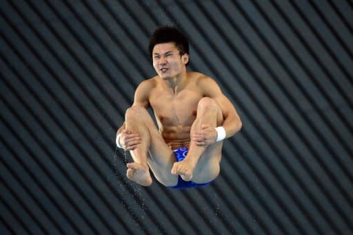 China's Qiu Bo competes in the men's 10m platform preliminary round during the diving event at the London 2012 Olympic Games, on August 10. Qiu will expect to collect China's seventh diving gold medal in Saturday's final, after leading Friday's qualifiers