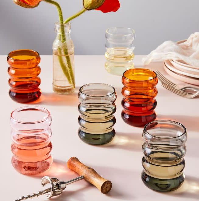 These tumbler glasses feature a unique, ripple design in four colors. Find them for $50 at <a href="https://fave.co/32RVDyK" target="_blank" rel="noopener noreferrer">Food52</a>.