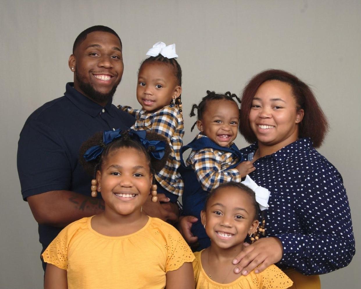 David Thorpe, Sr., (in the Navy Blue shirt) is shown in this photo with his 3 children, fiancee Teryana Frost, and niece. Thorpe, 28, was killed in a T-Bone style crash at Mason Avenue and  Bill France Boulevard as he was driving home from work, his family said. The crash occurred less than a block from where he worked, his fiancee said.