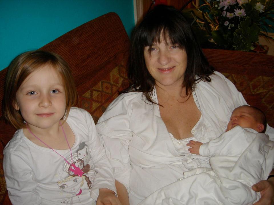 Woods with her daughters Lily and Tabitha