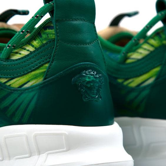 A close-up of the Versace logo on the back of the trainer (Concepts)