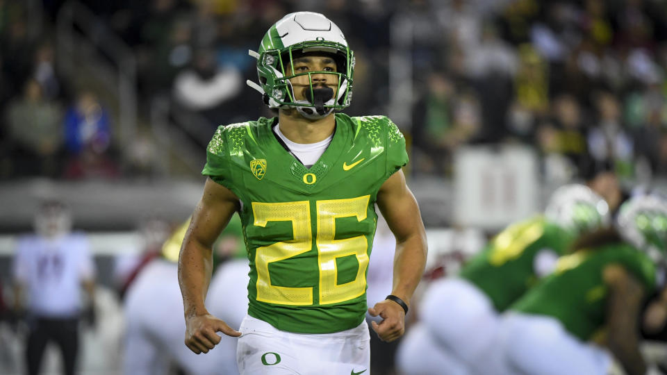 Oregon running back Travis Dye (26) during an NCAA college football game Saturday, Nov. 13, 2021, in Eugene, Ore. (AP Photo/Andy Nelson)