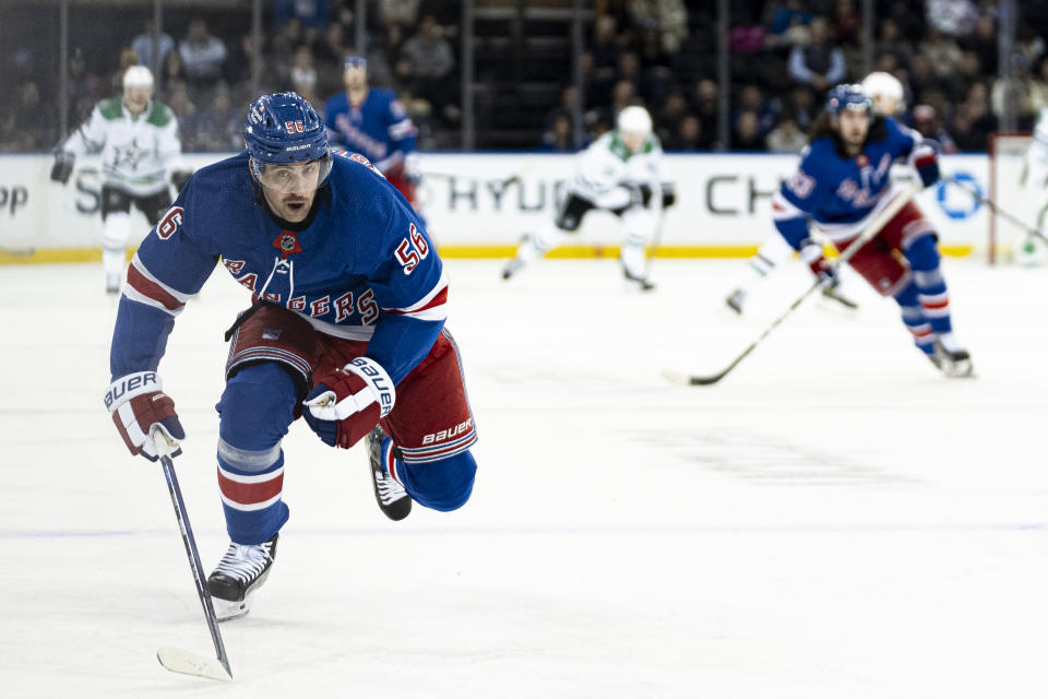 New York Rangers defenseman Erik Gustafsson (56) chases the puck during the first period of an NHL hockey game against the Dallas Stars on Tuesday, Feb. 20, 2024, in New York. (AP Photo/Peter K. Afriyie)