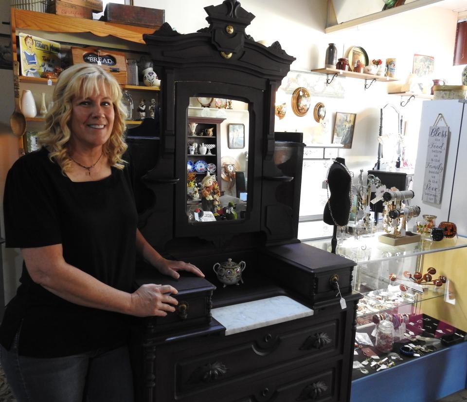 Julie Ronan refurbished old furniture and sells it at the Coshocton Antique Mall.