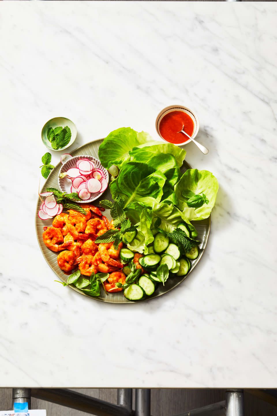<p>Set out a tray of healthy shrimp lettuce wraps made with veggies and fresh herbs for dinner tonight!</p><p>Get the <strong><a href="https://www.goodhousekeeping.com/food-recipes/easy/a37198848/shrimp-lettuce-wraps-recipe/" rel="nofollow noopener" target="_blank" data-ylk="slk:Spicy Shrimp Lettuce Wraps recipe" class="link ">Spicy Shrimp Lettuce Wraps recipe</a></strong>. </p><p><strong>RELATED: </strong><a href="https://www.goodhousekeeping.com/food-recipes/healthy/g572/healthy-shrimp-recipes/" rel="nofollow noopener" target="_blank" data-ylk="slk:28 Healthy and Delicious Ways to Eat All the Shrimp" class="link ">28 Healthy and Delicious Ways to Eat All the Shrimp</a></p>