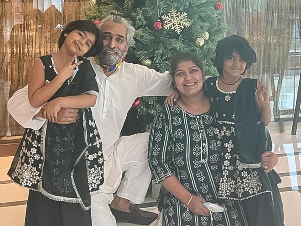 Ashni Kumar, center left, and Priya Guru, center right, of Wrightstown, have been on a three-year journey to adopt two young sisters from India, Aradhya, 9, left, and Riddhima, 8.