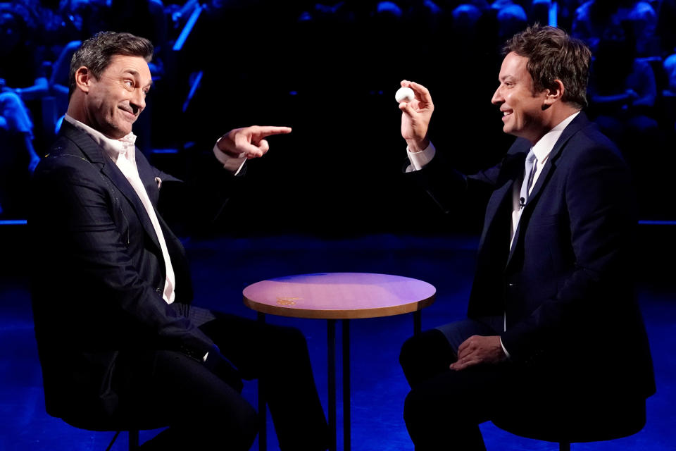 <p>John Hamm plays a round of Egg Russian Roulette with host Jimmy Fallon on the June 24 episode of <i>The Tonight Show</i> in N.Y.C. </p>