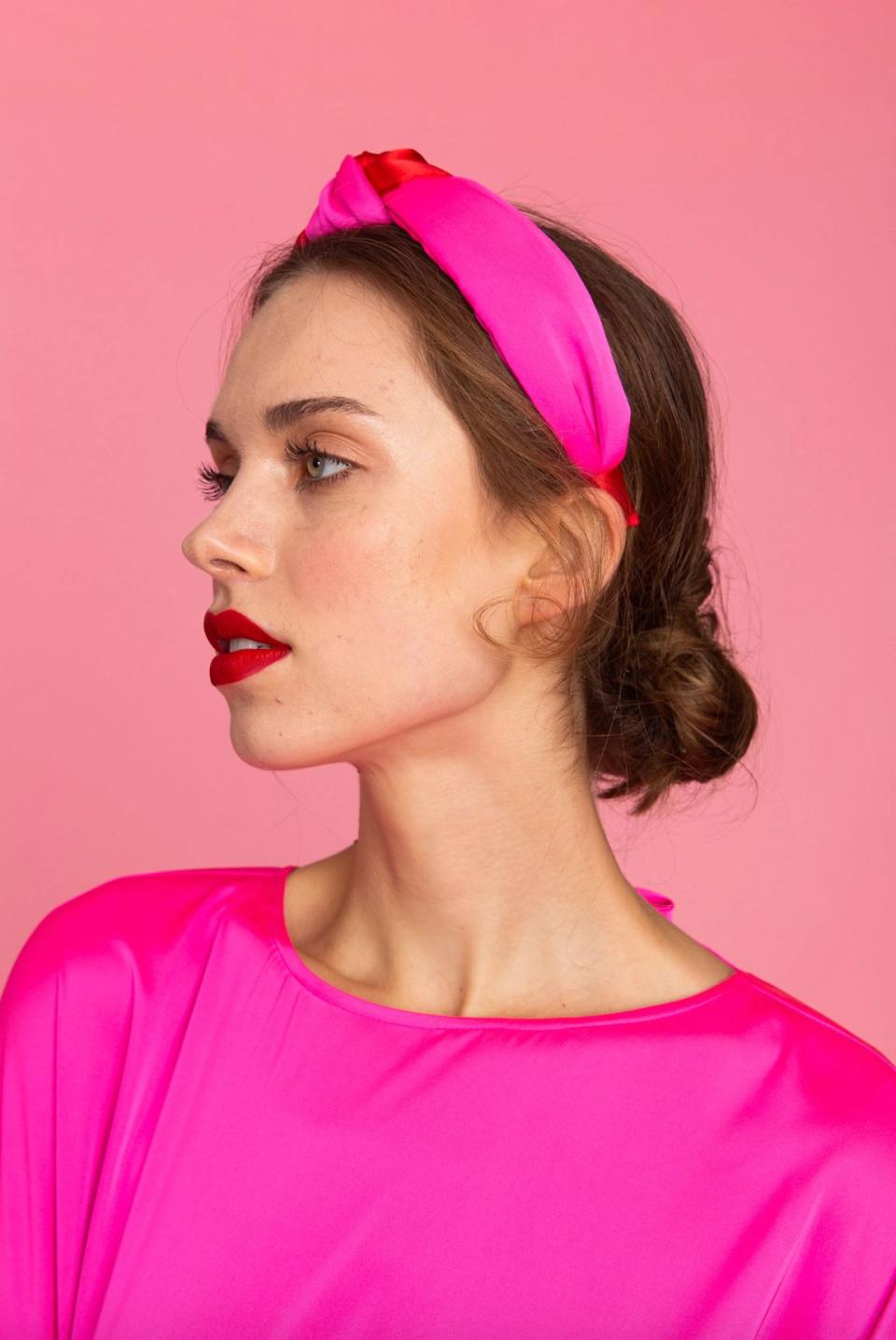 We love a red-and-pink color blocking moment, especially when that moment can also hide our messy bangs. &lt;br&gt;&lt;br&gt; <strong><a href="https://www.crosbybymollieburch.com/collections/holiday-2019/products/knotted-headband-2" target="_blank" rel="noopener noreferrer">Get the Crosby by Mollie Burch Holly Headband for $38.﻿</a></strong>