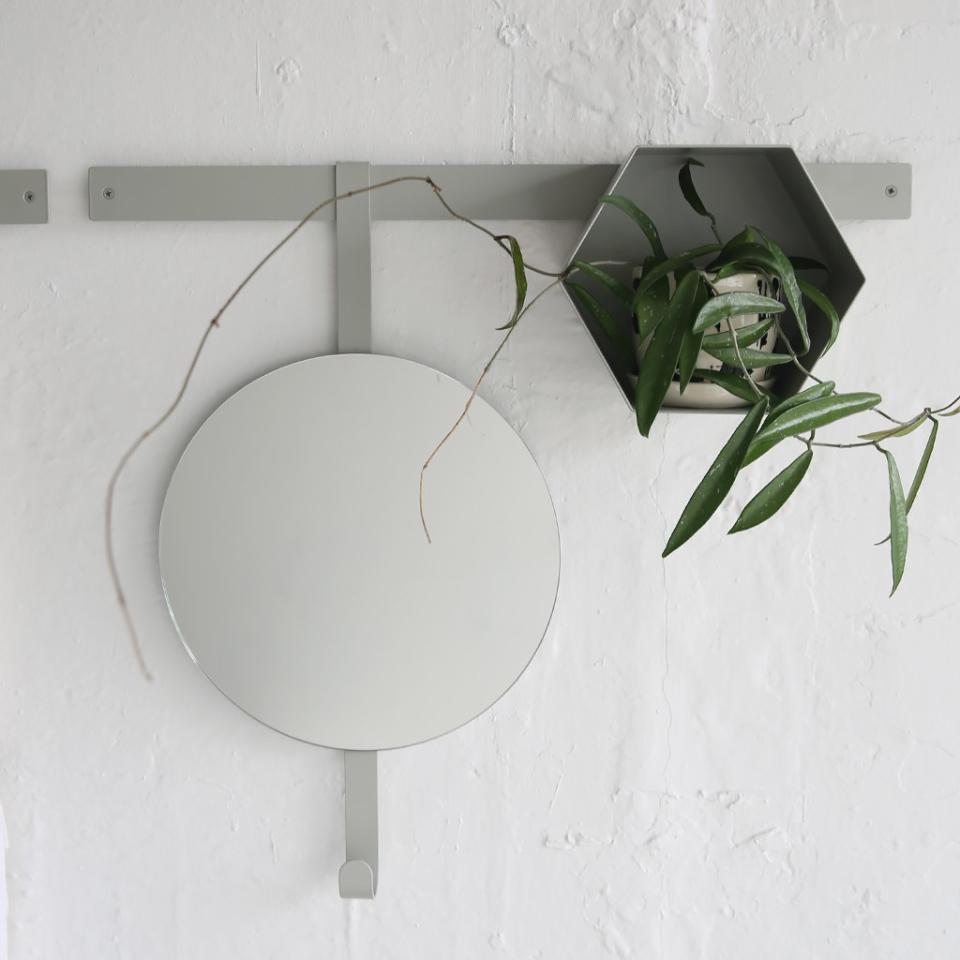 A mirror and shelf combo.