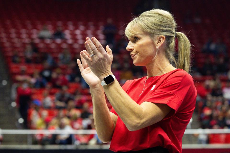 Utah gymnastics coach Carly Dockendorf claps during the Red Rocks Preview at the Huntsman Center on Dec. 15, 2023.