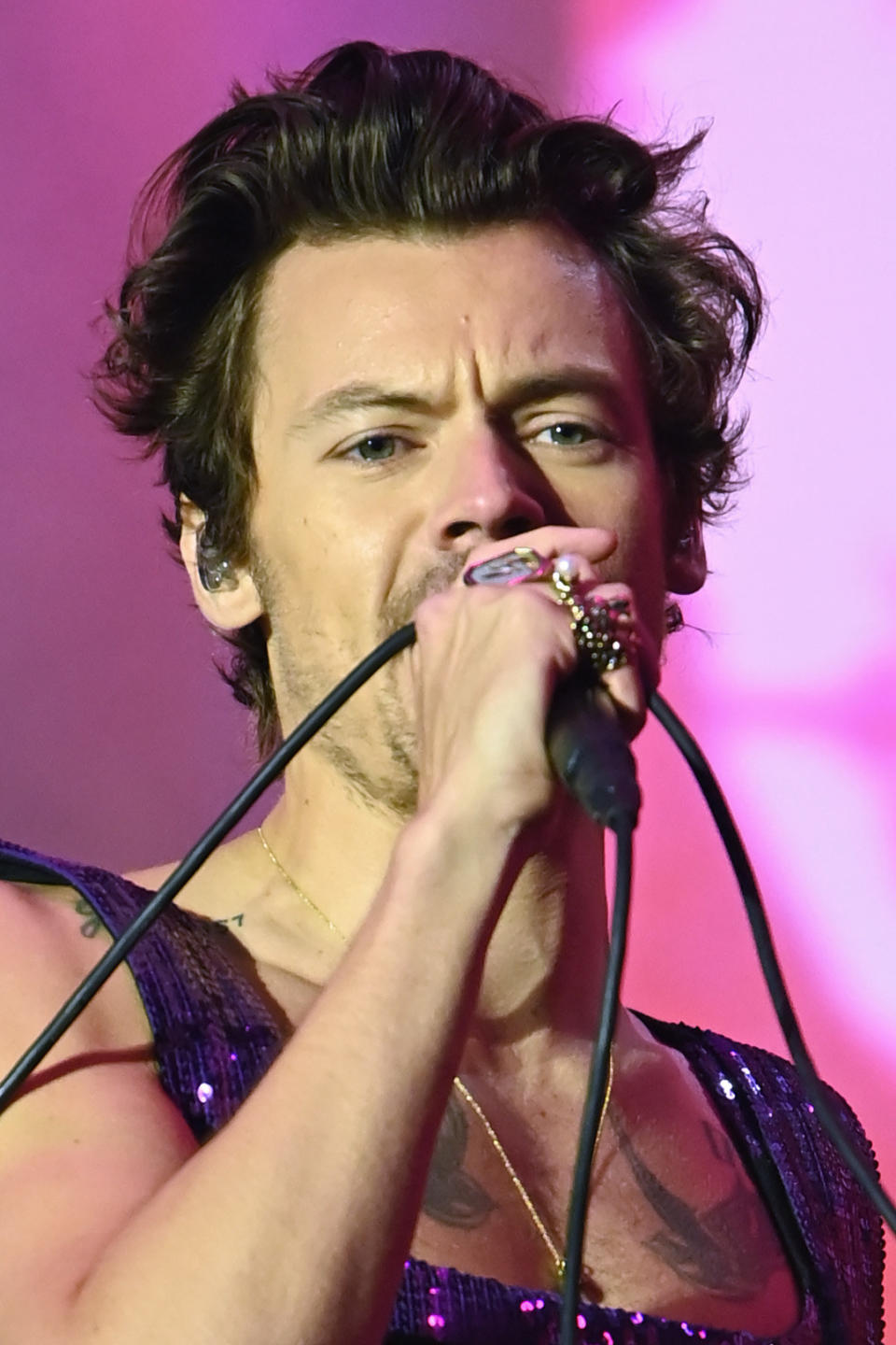 close up of harry singing