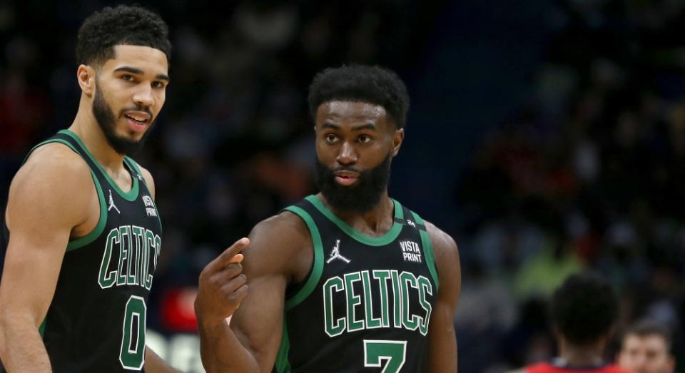 Jaylen Brown talking with Jayson Tatum