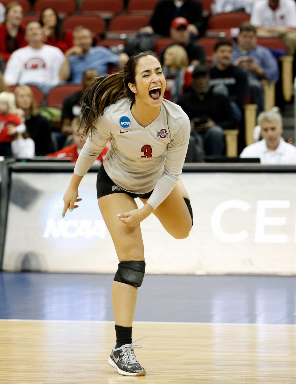 Ohio State's Valeria Leon celebrates after the Buckeyes registered a kill against the Badgers.  Dec. 12, 2014