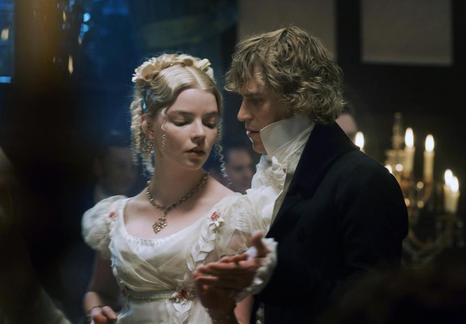 Anya Taylor-Joy and Johnny Flynn in period costume as characters from 'Emma', in a dance scene
