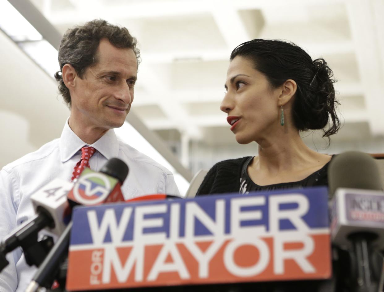 Then-New York mayoral candidate Anthony Weiner (left) and Huma Abedin (right)