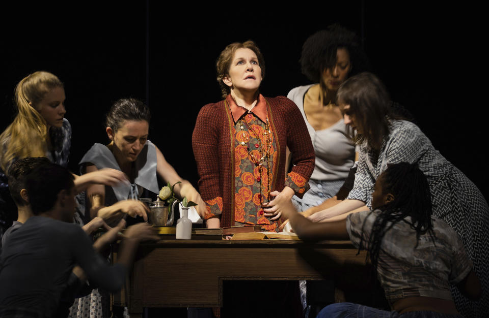 This image released by The Metropolitan Opera shows mezzo-soprano Joyce DiDonato, center, during a performance of Kevin Puts' "The Hours." (Evan Zimmerman/The Metropolitan Opera via AP)