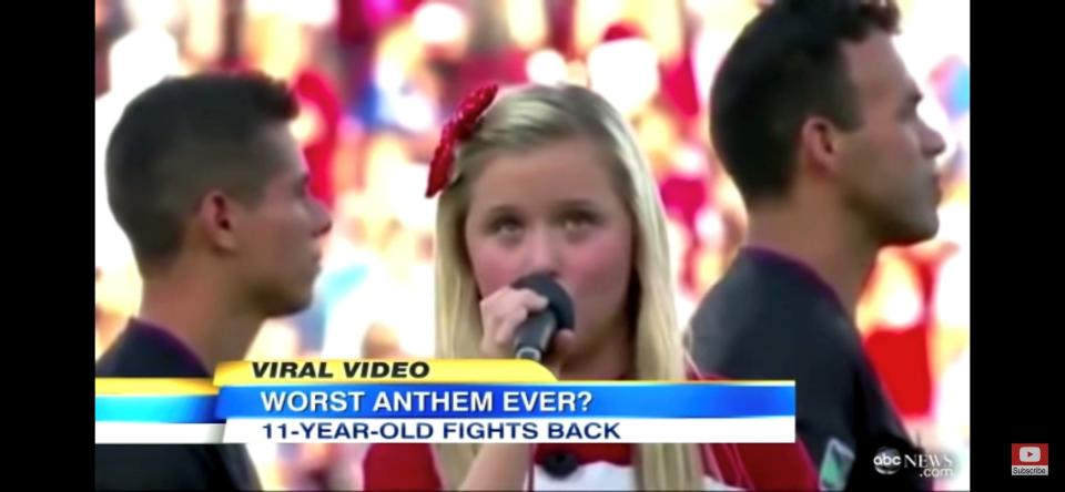 A screen grab from a 2011 ABC News story on Harper Grace singing what many online dubbed "worst national anthem ever" at an FC Dallas soccer match