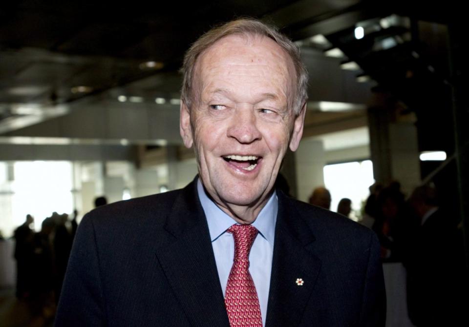 Former prime minister Jean Chrétien smiles as he arrives at a conference in Montreal in 2011. Chrétien was prime minister when the sponsorship scandal began to unfold. Photo from The Canadian Press