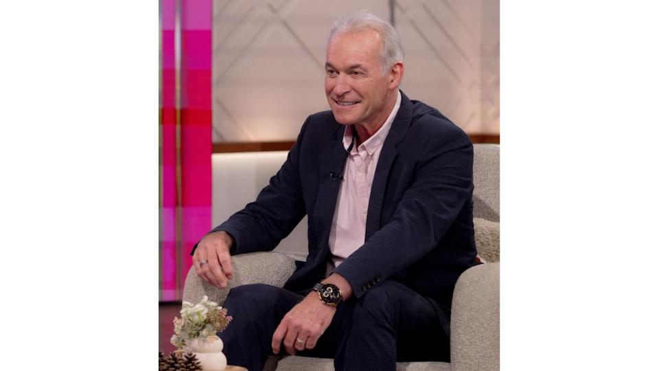 Dr Hilary Jones sits on Lorraine sofa