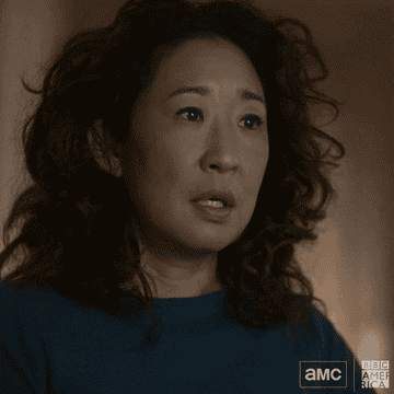 Sandra Oh runs her hands down her face and through her hair in Killing Eve