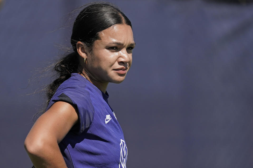 U.S. national team player Sophia Smith listens to instructions during practice for a match against Nigeria Tuesday, Aug. 30, 2022, in Riverside, Mo. Women’s soccer in the United States has struggled with diversity, starting with a pay-to-play model that can exclude talented kids from communities of color.(AP Photo/Charlie Riedel)