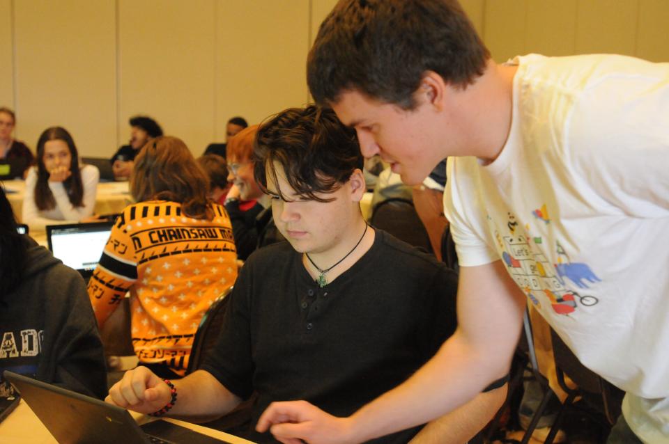 Centennial High School student Tristan Smith with Google Software Engineer Lukas Gnirke on December 4, 2023.