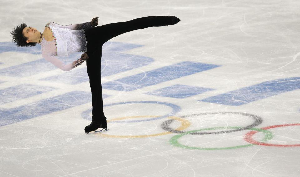 Yuzuru Hanyu of Japan competes in the men's free skate figure skating final at the Iceberg Skating Palace during the 2014 Winter Olympics, Friday, Feb. 14, 2014, in Sochi, Russia. (AP Photo/Vadim Ghirda)