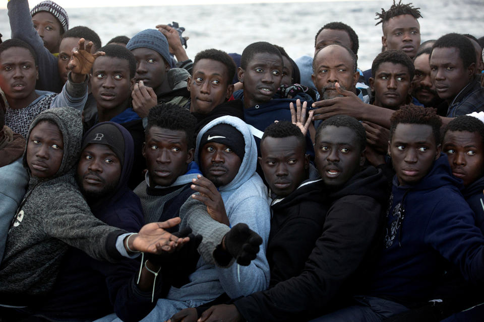 Overcrowded raft on Mediterranean Sea