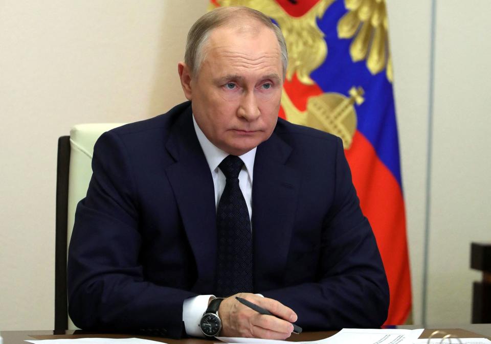 Russian President Vladimir Putin chairs a government meeting via a video link at the Novo-Ogaryovo state residence outside Moscow on March 23, 2022. - President Putin said on March 23 Russia will only accept payments in rubles for gas deliveries to 