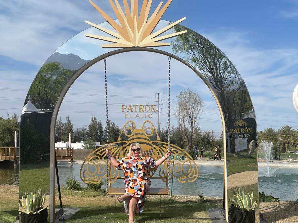 the writer on a swing at an event