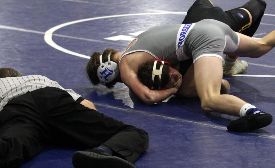 Horseheads' Ryan Massengale, top, pinned Windsor's Mathew Boyce in the 138-pound final at the Southern Tier Athletic Conference Wrestling Tournament on Jan. 21, 2023 at Owego Free Academy.