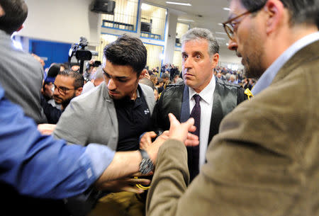 Prosecutor Antonino Di Matteo is escorted at the end of the reading of the sentence, at the end of a historic mafia case in which mob bosses and former high-ranking state officials were convicted of holding secret negotiations in the early 1990s, in Palermo, Italy April 20, 2018. REUTERS/Guglielmo Mangiapane