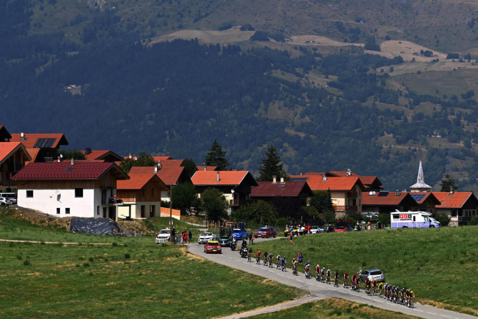 COURCHEVEL FRANCE  JULY 19 Jonas Vingegaard of Denmark and Team JumboVisma  Yellow Leader Jersey Tadej Pogacar of Slovenia and UAE Team Emirates  White Best Young Rider Jersey and a general view of the peloton competing during the stage seventeen of the 110th Tour de France 2023 a 1657km at stage from SaintGervais MontBlanc to Courchevel  UCIWT  on July 19 2023 in Courchevel France Photo by Tim de WaeleGetty Images