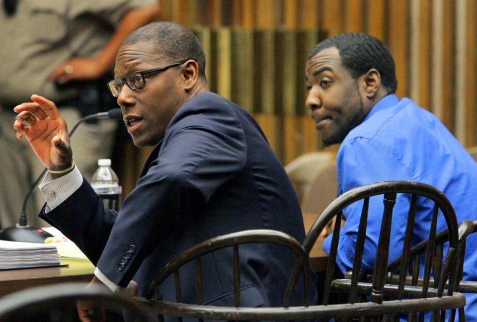 Defense attorney Stacey Jackson, left, talks with the prosecution as testimony begins in his client Adrian Patterson’s murder trial. Patterson faces multiple charges in the November 2014 shooting death of Robert Earl Bolden in Oakland Park. He was not initially charged in Bolden’s murder, but was arrested in September 2017.