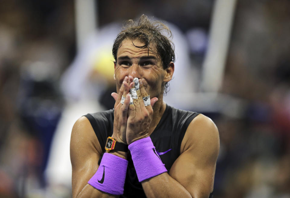 Rafael Nadal, of Spain, reacts after defeating Daniil Medvedev, of Russia, to win the men's singles final of the U.S. Open tennis championships Sunday, Sept. 8, 2019, in New York. (AP Photo/Charles Krupa)